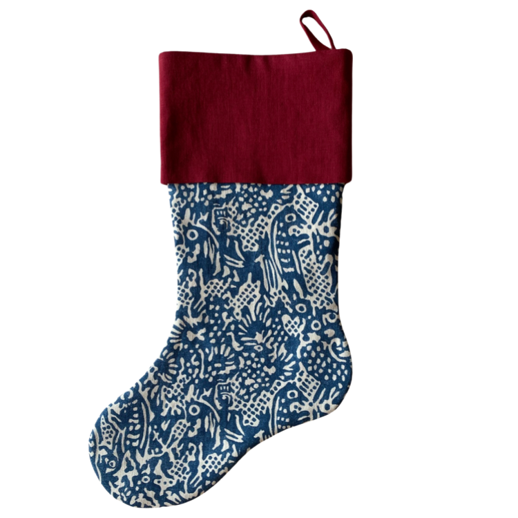 The Voyage Dubai - Chic and festive, our limited edition Christmas Tree stockings are made from Volga Linen's blue Aloysha print and finished with a contrasting European linen burgundy cuff and hook. The stockings are fully lined to hold their shape.