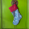 The Voyage Dubai - Chic and festive, our limited edition Christmas Tree stockings are made from Volga Linen's blue Aloysha print and finished with a contrasting European linen burgundy cuff and hook. The stockings are fully lined to hold their shape.