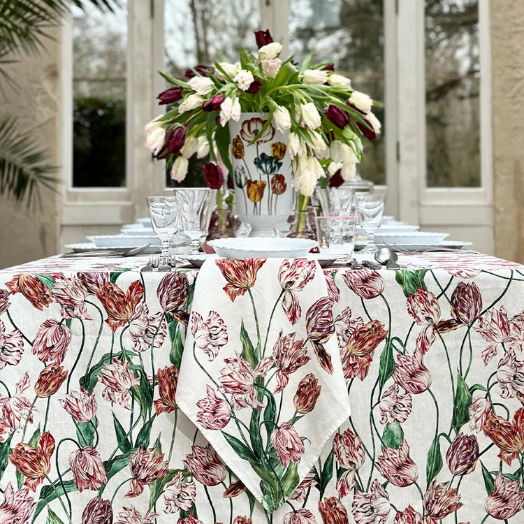 Tablecloth in Red & Pink

Tulipmania takes hold all over again… With rich, complex colours and elaborately curved and crimped petals that give each flower a distinctive character, this tablecloth explores the intriguing nature of the Tulip, a flower that has continued to beguile with its beauty,throughout the centuries.