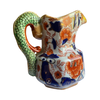 The Voyage Dubai - Antique Mason's Ironstone Imari Jug A rare, antique Mason's Ironstone Hydra Jug with a superb serpent handle in a lovely Imari Pattern. The jug has the octagonal "hydra" shape with a notched snake handle and is decorated in distinctive cobalt blue and floral pattern, which is one of Mason's well known chinoiserie patterns, using bold hand painted enamels of cobalt blue, green and burnt orange all in various shades.