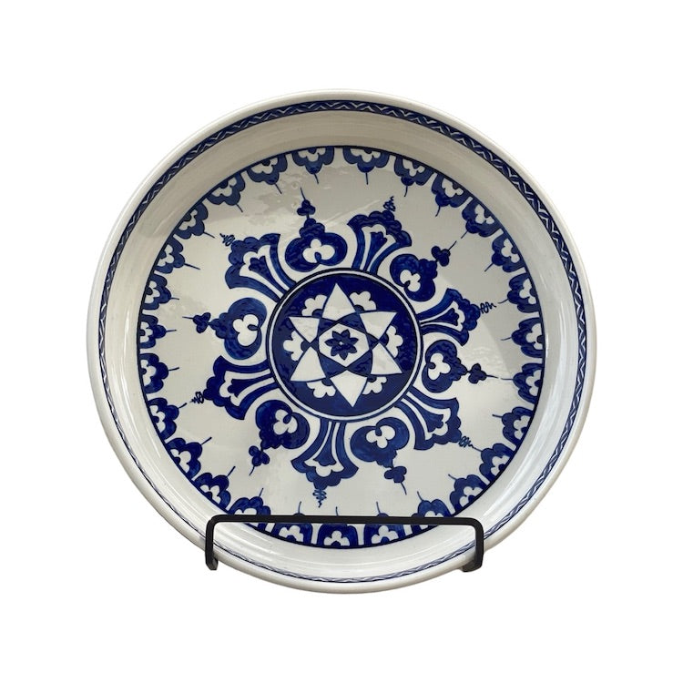 The Voyage Dubai - One of a kind, hand-painted Iznik ceramic dish from Turkey featuring a bold blue and white geometric design. 