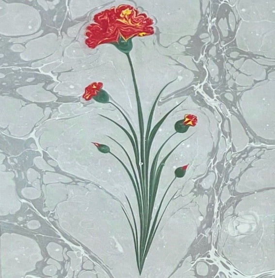 The Voyage Dubai - Hand painted carnation flowers on marbled paper (Ebru).  Presented in a gilt, faux bamboo frame with forest green mat.