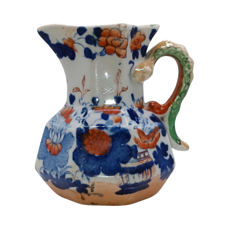 The Voyage Dubai - Antique Mason's Ironstone Imari Jug  A rare, antique Mason's Ironstone Hydra Jug with a superb serpent handle in a lovely Imari Pattern.  The jug has the octagonal "hydra" shape with a notched snake handle and is decorated in distinctive cobalt blue and floral pattern, which is one of Mason's well known chinoiserie patterns, using bold hand painted enamels of cobalt blue, green and burnt orange all in various shades.