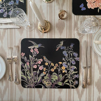 The Voyage Dubai - These one of kind découpage placemats are made by an artist in Hudson, New York using delicately cut and applied 18th and 19th century botanical birds and flowers. 