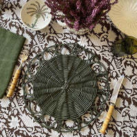 The Voyage Dubai - Available in four striking variations, our wicker placemats are handwoven by artisans in India. Use them to create a bold, layered tablescape.