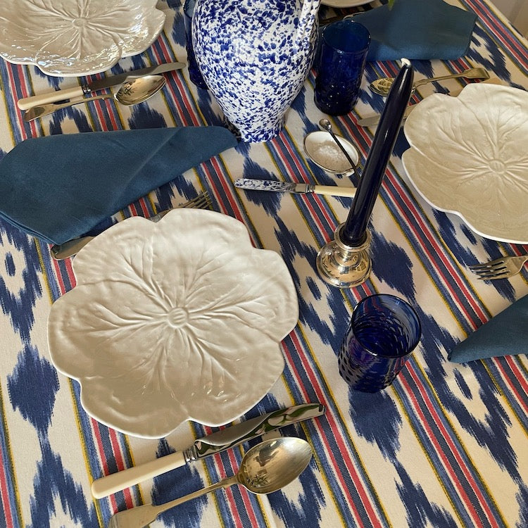 The Voyage Dubai - Mallorcan Ikat Tablecloth in Carnival  A striking cotton blend tablecloth printed in this traditional geometric motif reflective of the easy Mediterranean lifestyle. Perfect for long lunches and alfresco dining.  Origin: Spain Made by hand locally  Also available in other colours.